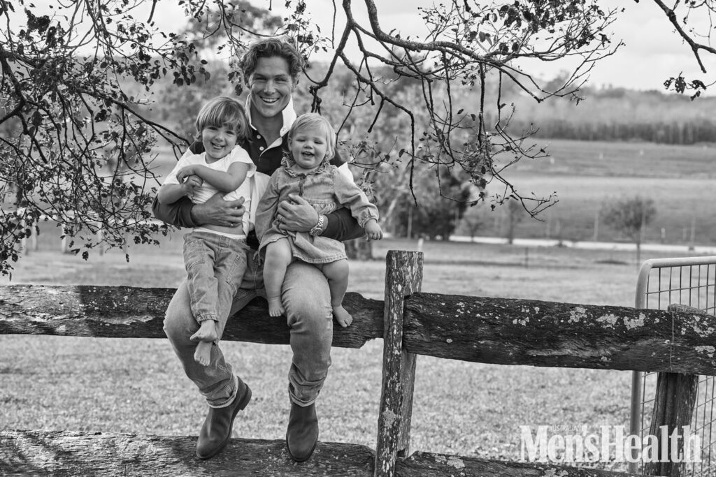 Michael Hooper with kids in black and white