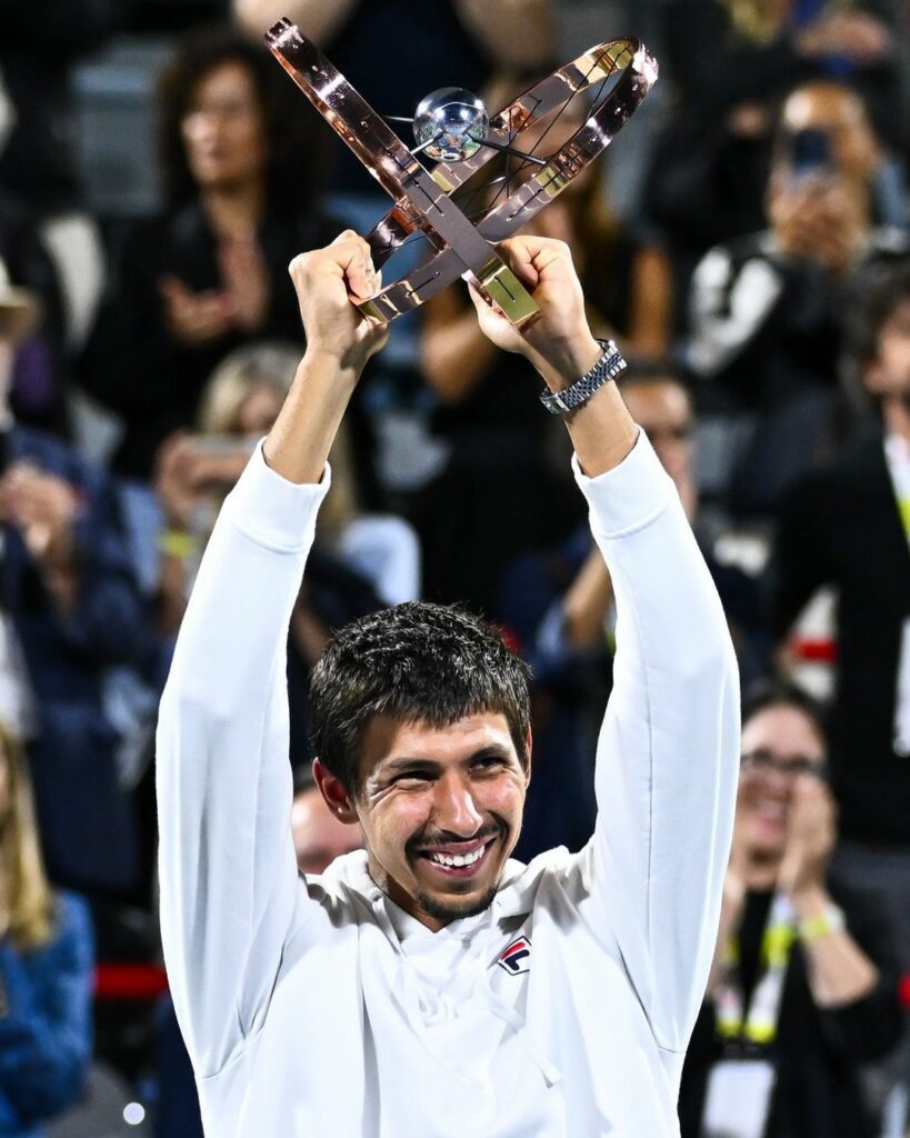 Australian tennis player Alexei Popyrin lifts the trophy at the Montreal Masters